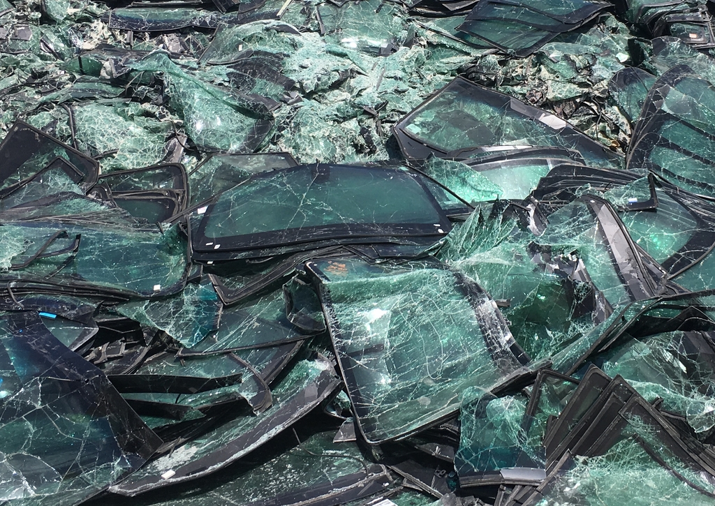 Recycled adhesive from broken car windows